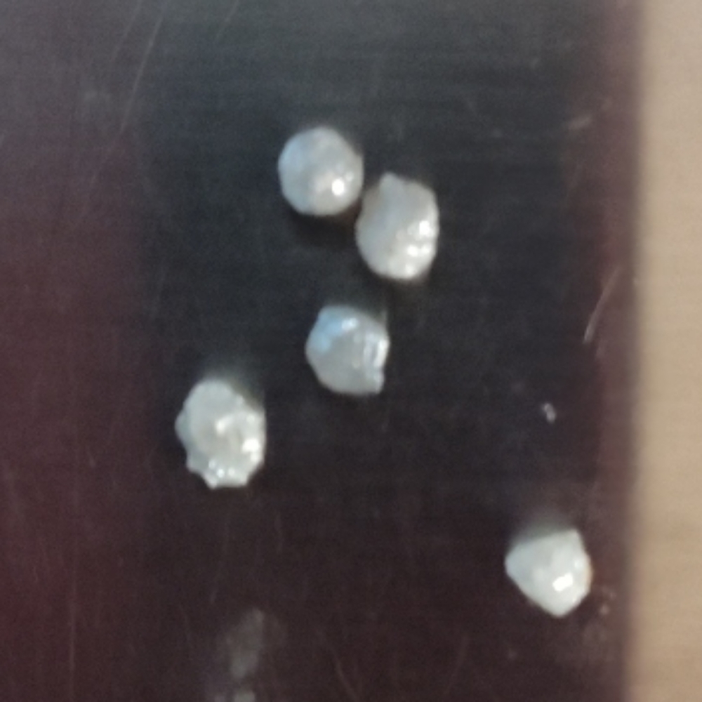 Rough earth mined diamonds